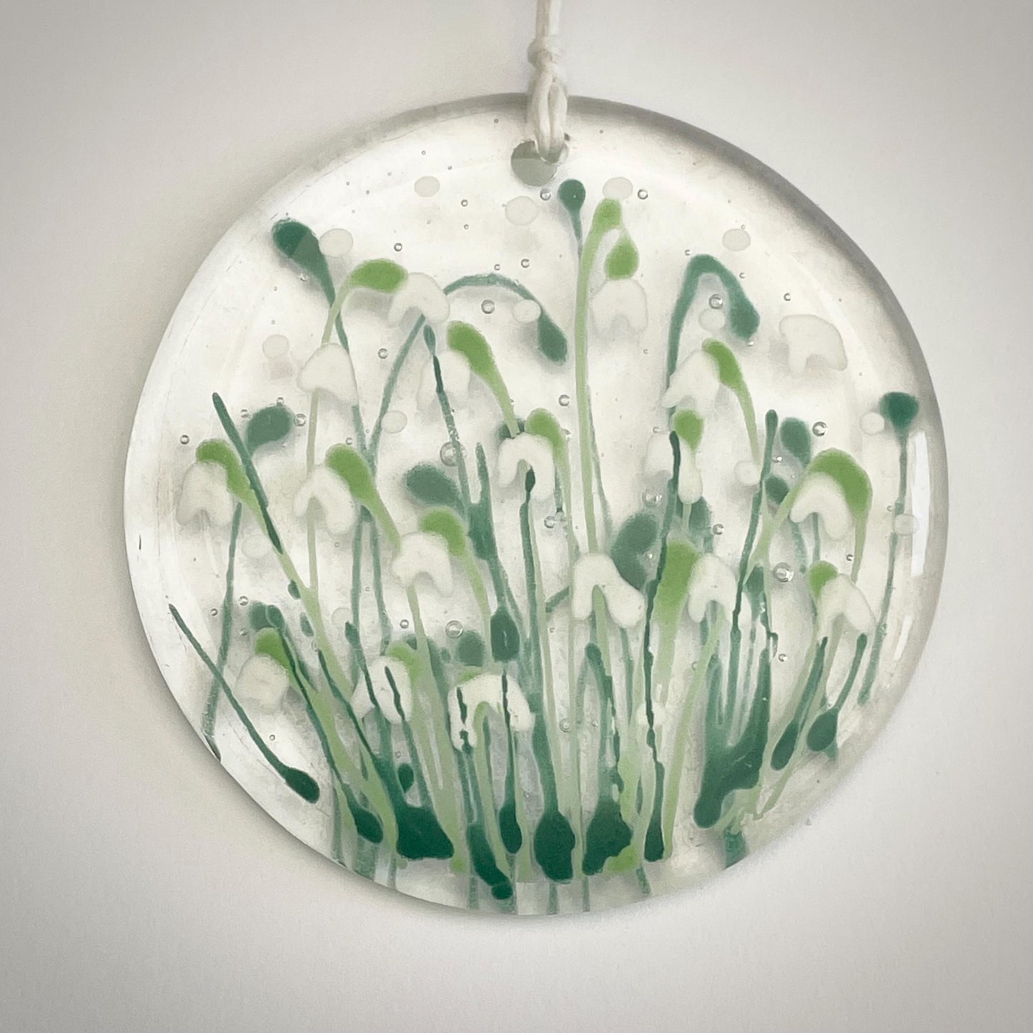 Snowdrops - hand painted fused glass round hanger