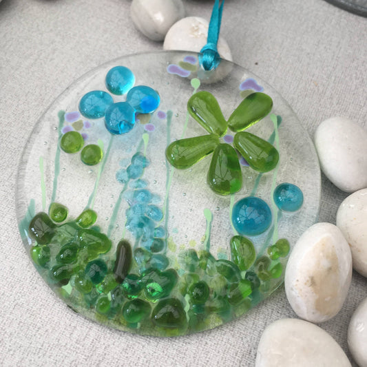 Fused glass window hanger in turquoise and lime green florals
