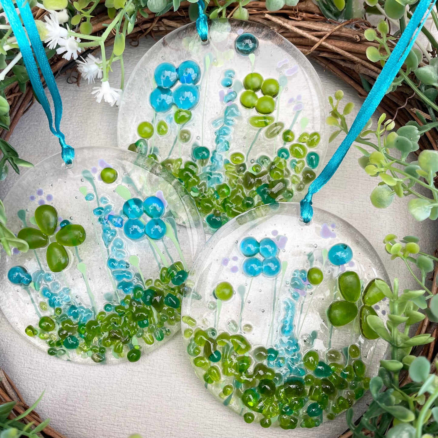 Fused glass window hanger in turquoise and lime green florals