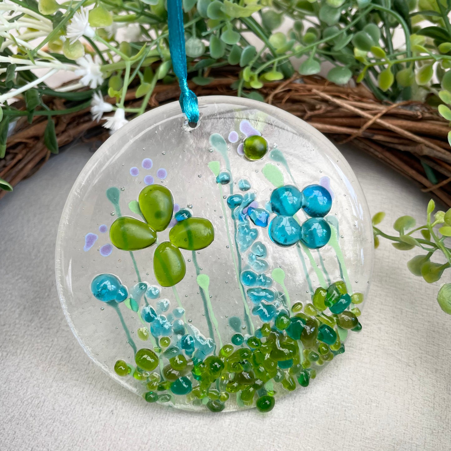 Fused glass window hanger in turquoise and lime green florals