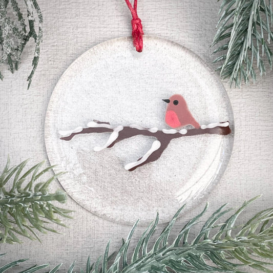 Robin on a snowy branch - round hanger