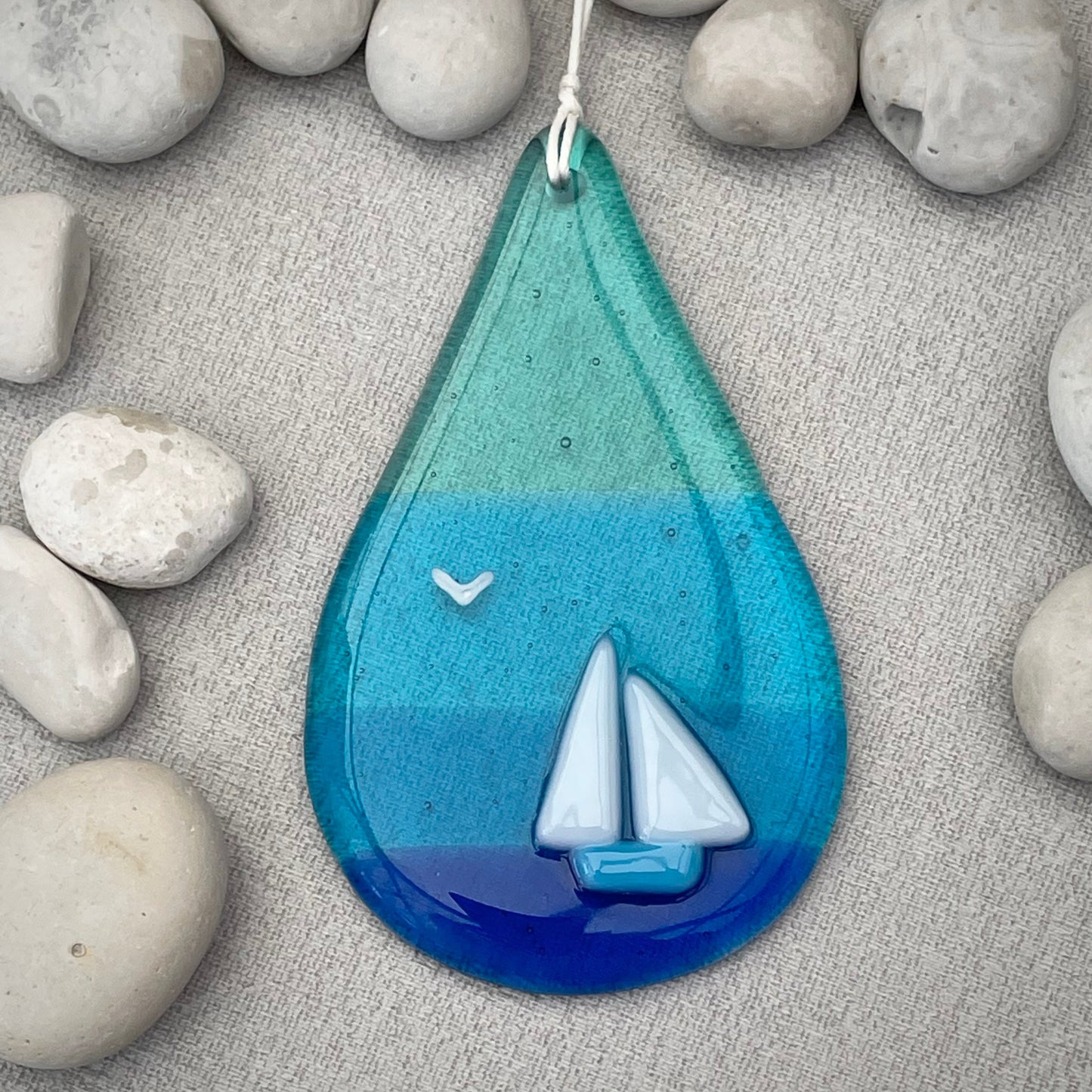 A Drop in the Ocean ~ Fused glass blue turquoise seascape teardrop window hanger